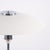 Table lamp by lyfa with white metal shades, nickel-plated frame and brown cord with switch. The lamp dates from around the...