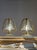 A pair of vintage Barovier & Toso table lamps, made in Murano in the 1950s. The brass structure forms a softly curved...