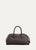 This Tod's Bauletto tote bag is crafted of soft, exposed grained leather and features two rolled top handles, a hanging...
