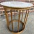 This is a John Van Koert for Drexel side or lamp table from their Parkwood collection. It features a walnut spindle base...