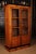 Biedermeier bookcase or vitrine, circa 1815. Cherry tree on solid partly ebonized. On stepped frame base, high-rectangular...