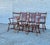 Solid hardwood construction by Harden Furniture. Set of six dining chairs with shaped spindle backs and turned legs. Warm...