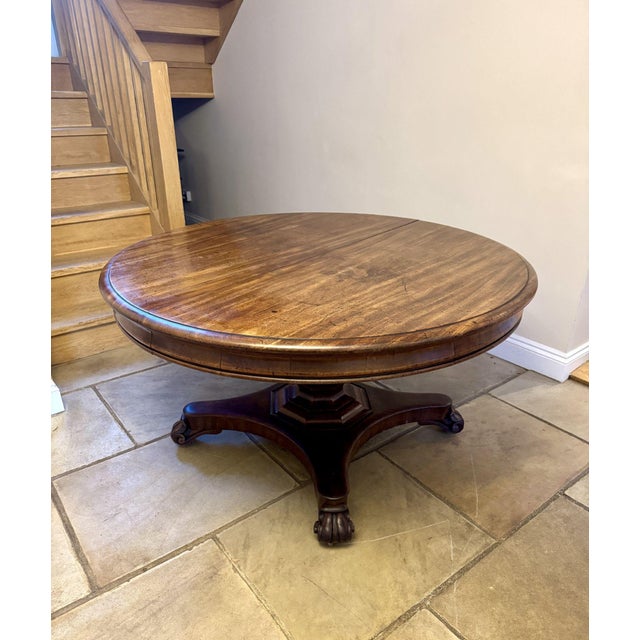Fine quality antique victorian figured mahogany extendable dining table, having a quality antique victorian mahogany...