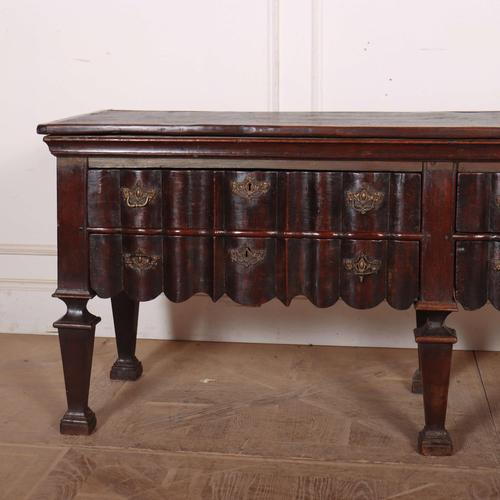 Wonderful 18th C Dutch 4 drawer oak dresser base. 1780 This piece is designed in the style of the selected designer and/or...