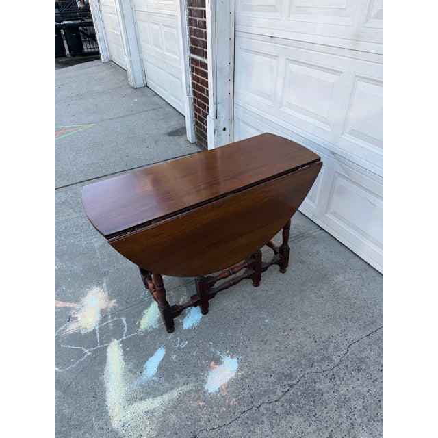Mid 20th Century Vintage Jacobean Style Mahogany Gateleg Drop-Leaf Dining Table With Turned Stretcher Base For Sale - Image 5 of 12