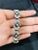 This is part of Chairish’s Fine Jewelry assortment. This Art Deco Style Diamond and Blue Sapphire Bracelet in 18K gold...