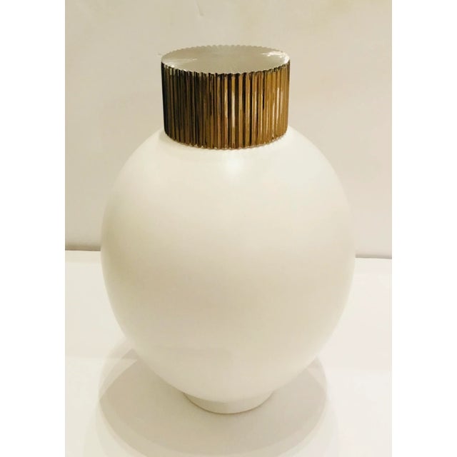 Stylish Global Views Modern Small White Blanc De Chine Jar, ribbed silver finished metal lid, showroom floor sample
