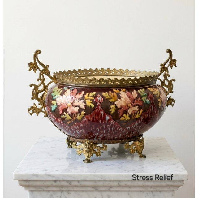 A spectacular late 19th century French majolica jardinière, cachepot, or centerpiece planter with dramatic bronze dragon-...