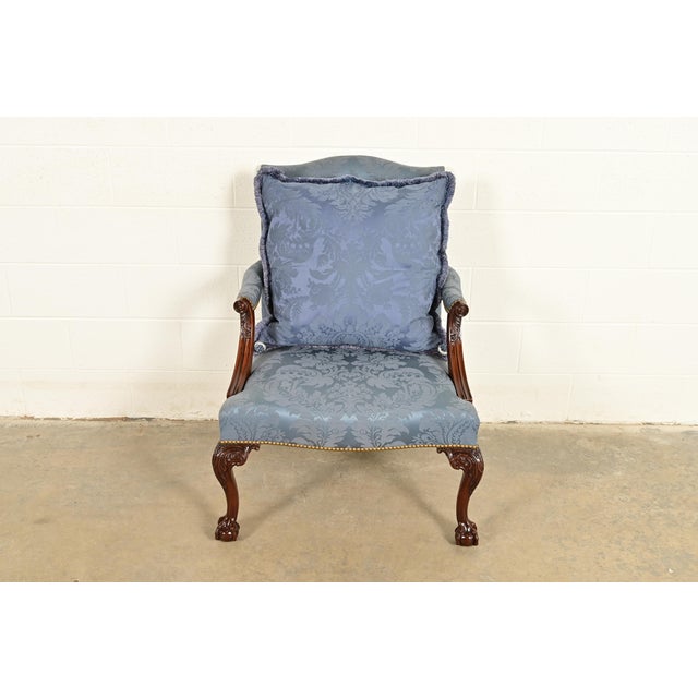 A gorgeous Chippendale or Georgian carved mahogany open arm library chair or lounge chair By Kittinger USA, 1991 Solid...