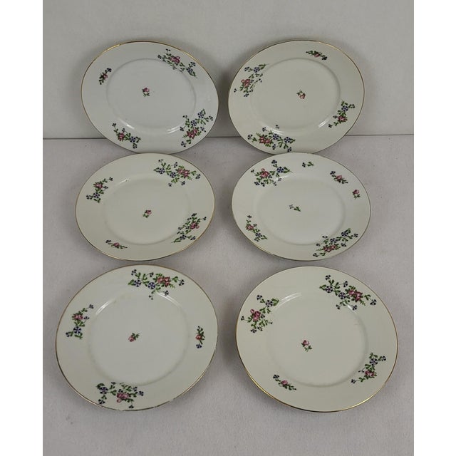 Set of 6 Limoges porcelain dessert plates, barbel/or cornflower decoration. Diameter 20 cm This piece has an attribution...
