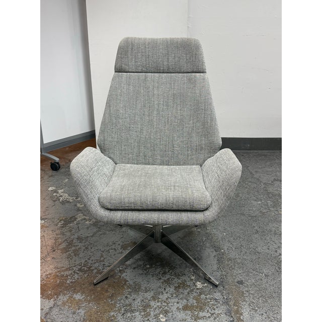 Design Plus Gallery presents a Conexus High Back Swivel Lounge Chair by Michael Vanderbyl for HBF. The Conexus collection...