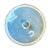 A round ceramic bright baby blue covered dish with a lid. This piece is round and features a figurative Mediterranean...