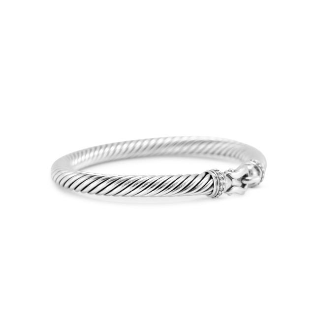 Brand: David Yurman Gender: Ladies Metal Type: 925 Silver Length: 5.50 inches Width: 5.00 mm Weight: 25.61 grams David...