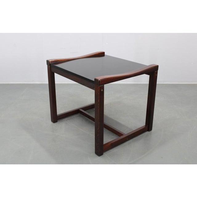 This refined Mid-Century Modern side table was designed by Karin Mobring for IKEA and produced in Sweden during the 1970s....