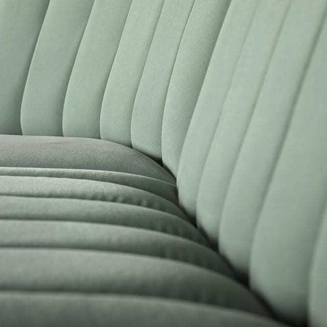 Sophia Sectional Sofa draws inspiration from the aesthetics of Mid-century Modern Design. It is upholstered in velvet and...