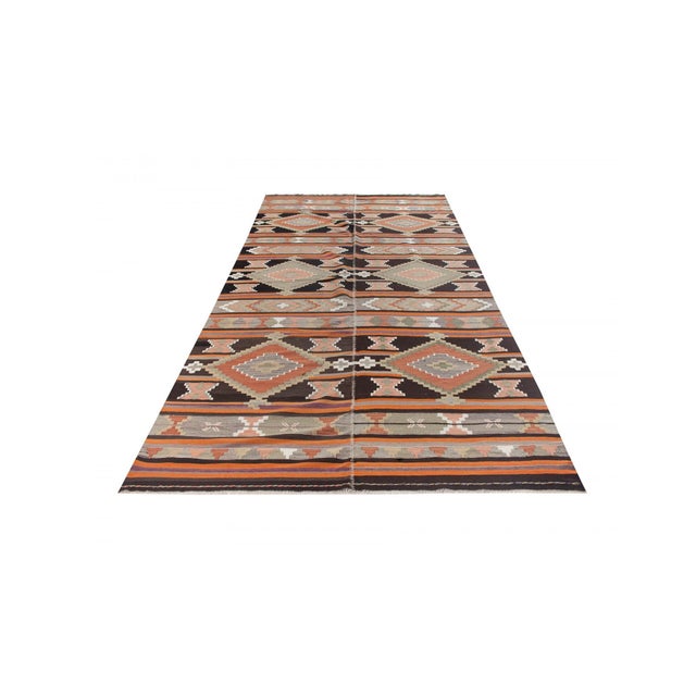 Vintage handwoven decorative kilim rug from Malatya region of Turkey. Approximately 50-60 years old. In very good condition.