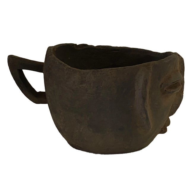 Superb and unique carved wood Kuba cup in the form of a human head. Figural cups such as this cups are among the most...