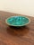 A stunning Russian style malachite bowl with brass trim Late 20th century Measures: 3.75"W x 3.75"D x 1"H. Very good...