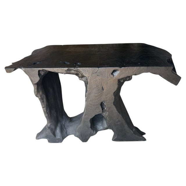 Impressive century old mahogany wood, hand carved into a one of a kind console table both usable and sculptural. Fabulous...