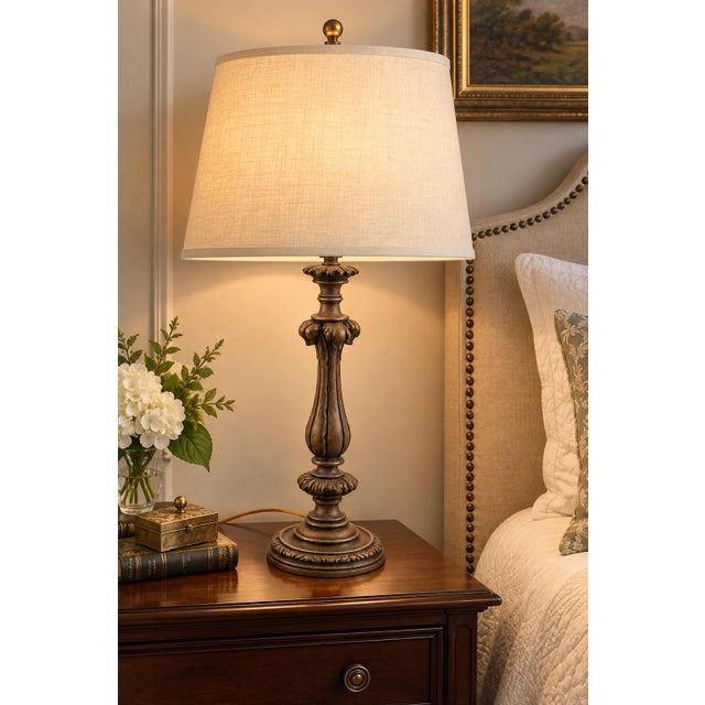 A beautifully proportioned vintage Neoclassical table lamp distinguished by a tall fluted baluster body, sculptural...