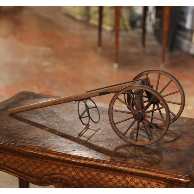 Add a touch of French country charm to a dining room, wine cellar, or bar area with this unusual antique wine bottle...