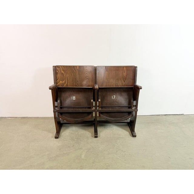 This two-seat cinema bench was produced by Ton (former Thonet) in former Czechoslovakia during the 1960s. The chairs are...