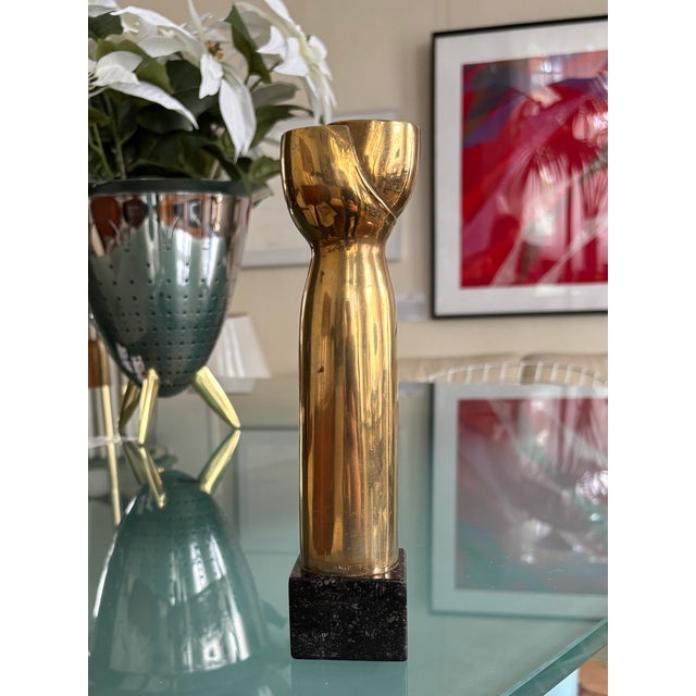 The brass sculpture by Sigurd Persson, limited to 12 pieces, is signed SIGP, dated '73 and numbered 1/12. This piece has...
