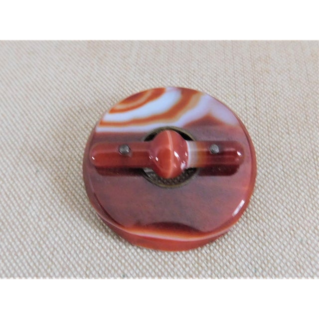 Antique Scottish Orange Agate Large Round Brooch Pin with agate crossbar. This 1.50 inch in diameter brooch with safety...