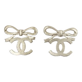 Chanel Light Gold Ribbon Bow CC Clip on Earrings, A Pair For Sale