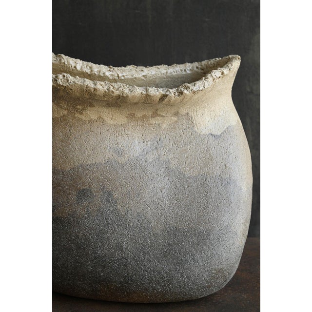 This is a one-of-a-kind vase by a contemporary Japanese ceramic artist. On the underside of the base, the character "京"...