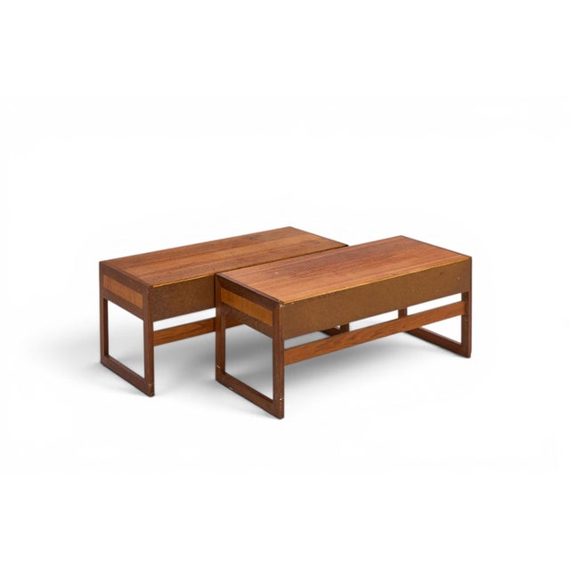 A rare matched pair of Hall Furniture Varie wall cabinets designed by Arne Wahl Iversen for IKEA, showcasing the clean...