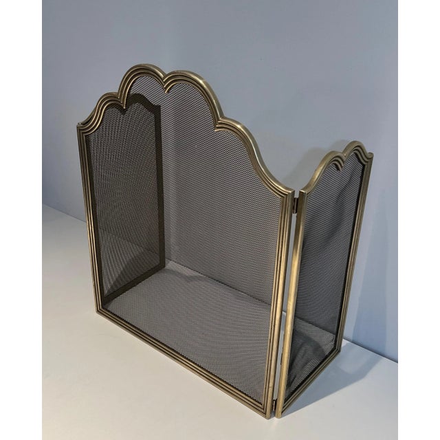 This neoclassical style 3 panels fireplace screen is made of brass and grilling. This is a very nice maodel with a unusual...