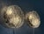 Set of 2 glass wall lamps by kaiser leuchten, germany (marked). thick ice glass shades fasten with chrome plated...