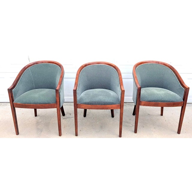 An exceptional collection of seven vintage Ward Bennett chairs for Brickel Associates, comprising three distinct Bennett...
