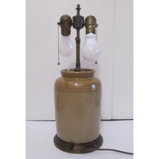 This is a treasure. Beautiful two-tone lamp with a high glaze in terra cotta. It is a wonderful vintage piece--an Vintage...