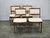 An elegant set of four authentic Danish Modern dining chairs designed by Hugo Frandsen and produced by Spøttrup...