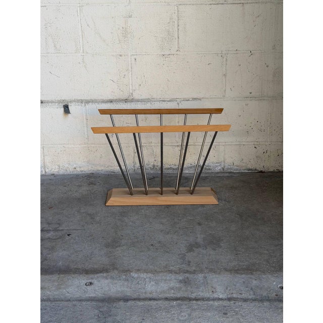 Updated Vintage Danish Modern magazine rack by Hoigaard Design, featuring a sculptural minimalist form with solid wood...