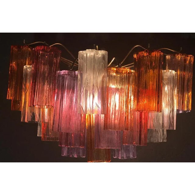 This marvelous pair of sconces with rare color combination considering the uniqueness with amber, pink, red and ice color...
