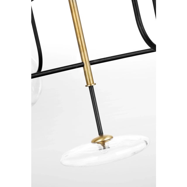 Calvino X-Large Arched Chandelier in Aged Iron and Hand-Rubbed Antique Brass with Clear Glass Designer: Ian K. Fowler...