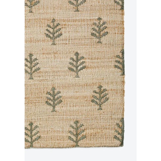 This block print patterned rug is hand woven from jute and wool, providing you with interesting texture and remarkable...