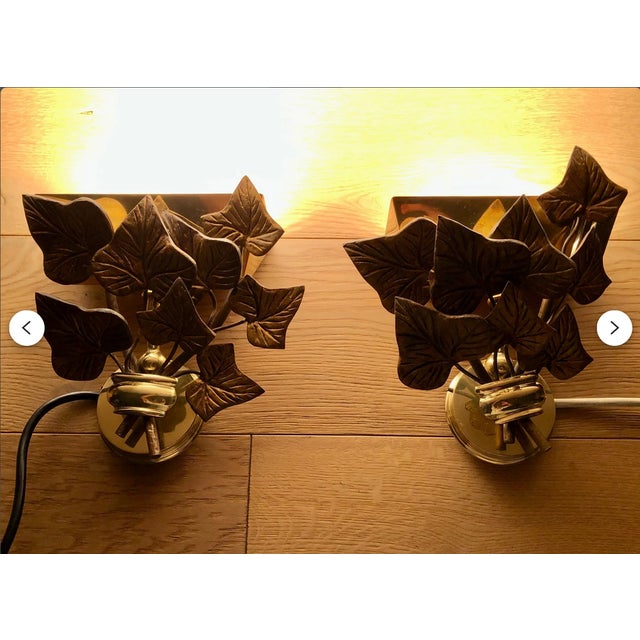 A most delightful pair of gilded bronze sconces, sumptuously ornate with Baroque-Floral design elements, an elegant design...