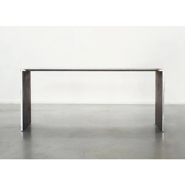 Memento mori desk 02 by boldizar senteski dimensions: 180 w x 45 d x h 72 cm materials: raw steel, oxidized mirror....