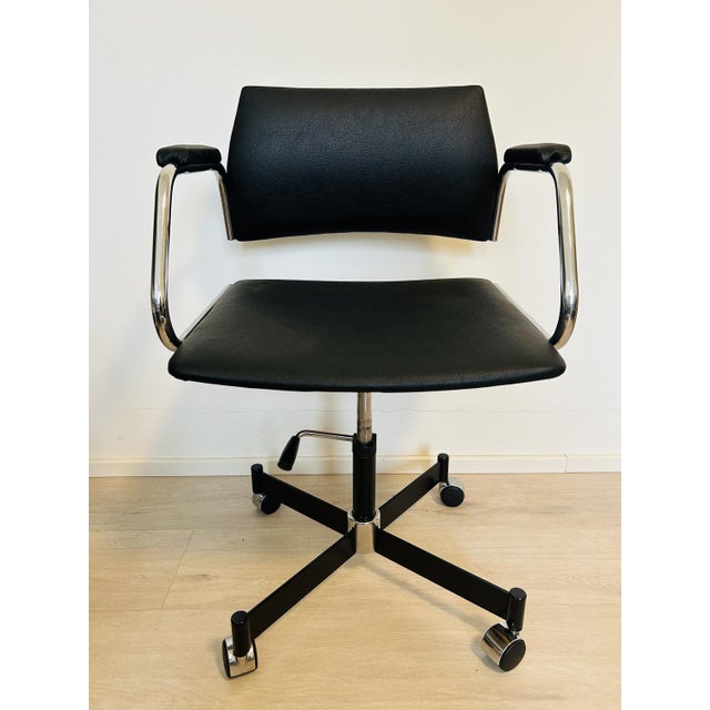 Fully Kovona Black Office Armchair, Czechoslovakia, 1970s, in Restored conditions. Designed 1970 to 1979 This piece has an...