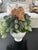 A one-of-a-kind, custom-designed faux succulent arrangement created by my studio and composed in a classic white ceramic...