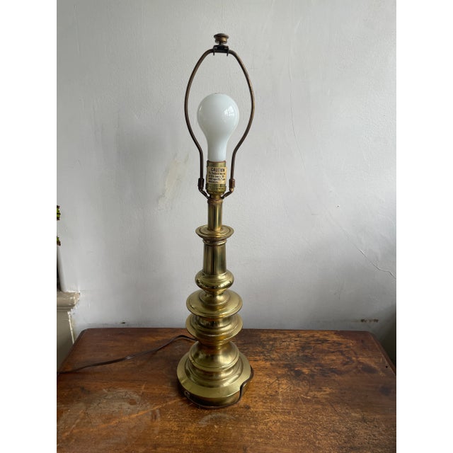 A gorgeous Mid-Century Brass Table Lamp. Probably made by Stiffel, unmarked in the USA of solid brass, very heavy, weighs...