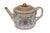 It includes three pieces, a teapot, lidded sugar bowl and tall, helmet-shaped creamer. All of generous proportions and...