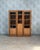 This large art deco display cabinet embodies the understated, geometric elegance of the interwar period. Its three glass...