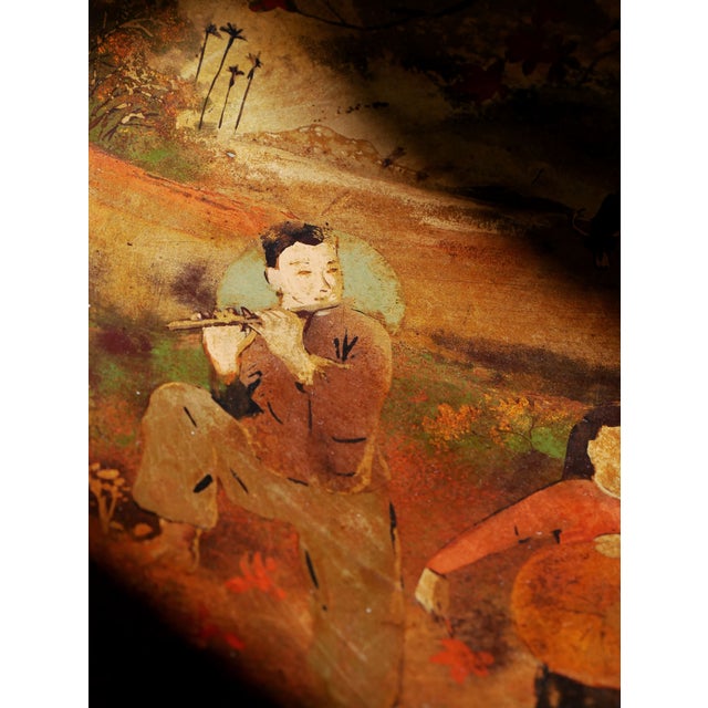 Unique vietnamese plate with hand painted figurative motive. Gold painted. This piece has an attribution mark, I am sure...