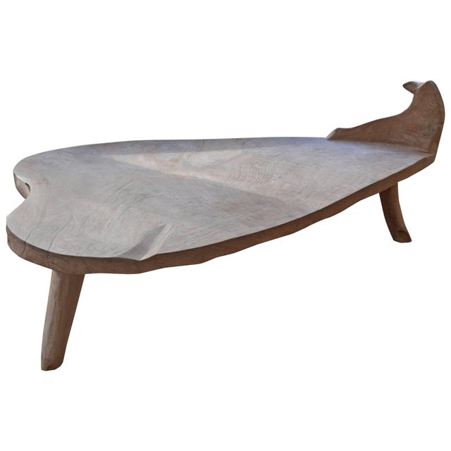 Impressive rare antique bench or coffee table cut from a single teak slab. The small back rest is hand carved from the...