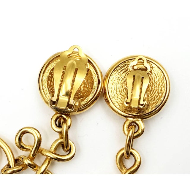 Chanel Chanel Vintage Gold Plated Round CC Twisted Cross Long Clip on Earrings, A Pair For Sale - Image 4 of 5